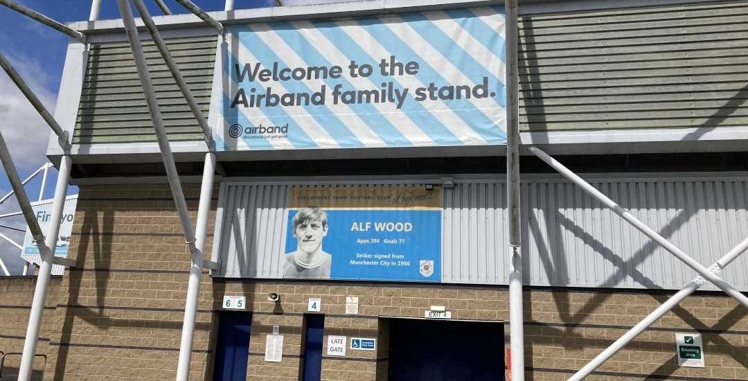 The Airband family stand at Shrewsbury Town FC.